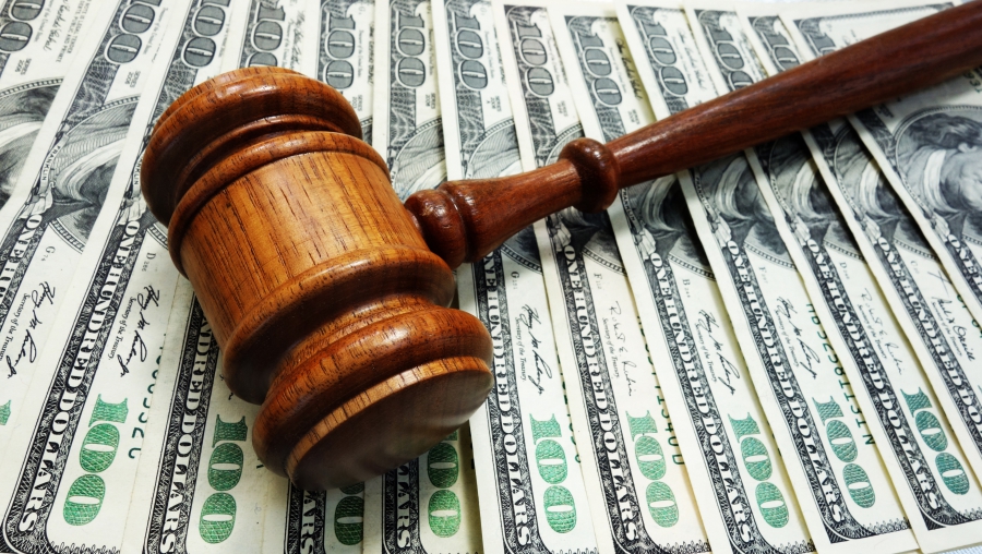 gavel on cash