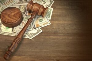girvin-gavel-on-money